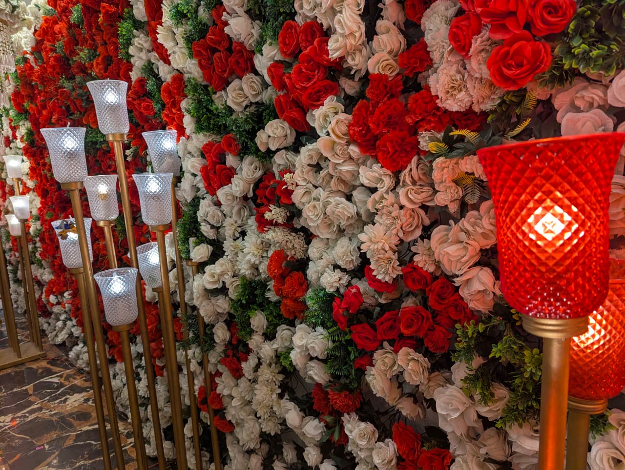 Rose wall detail with candle lamps