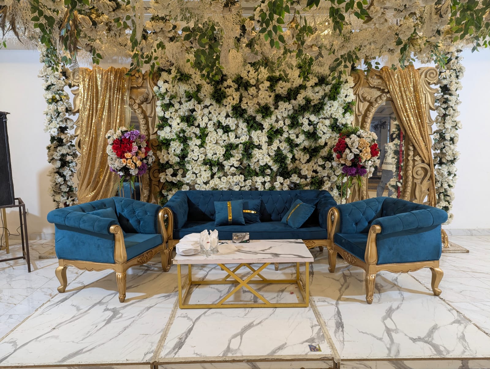 White floral arch walkway